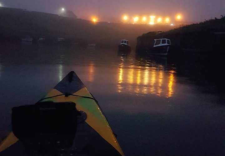 northumberland kayak fishing woman